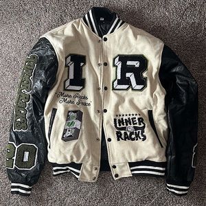 Here we have a varsity jacket. Worn probably 3 times it’s a small, true to size